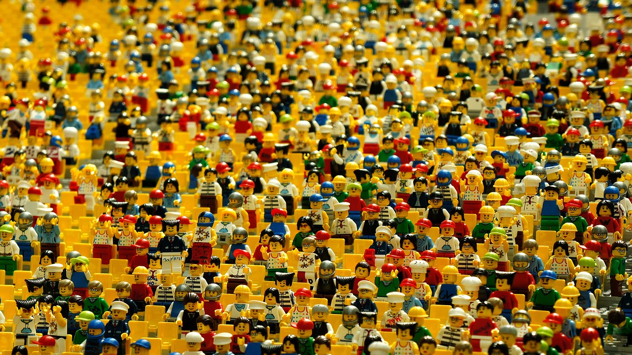 lego figures standing tight together